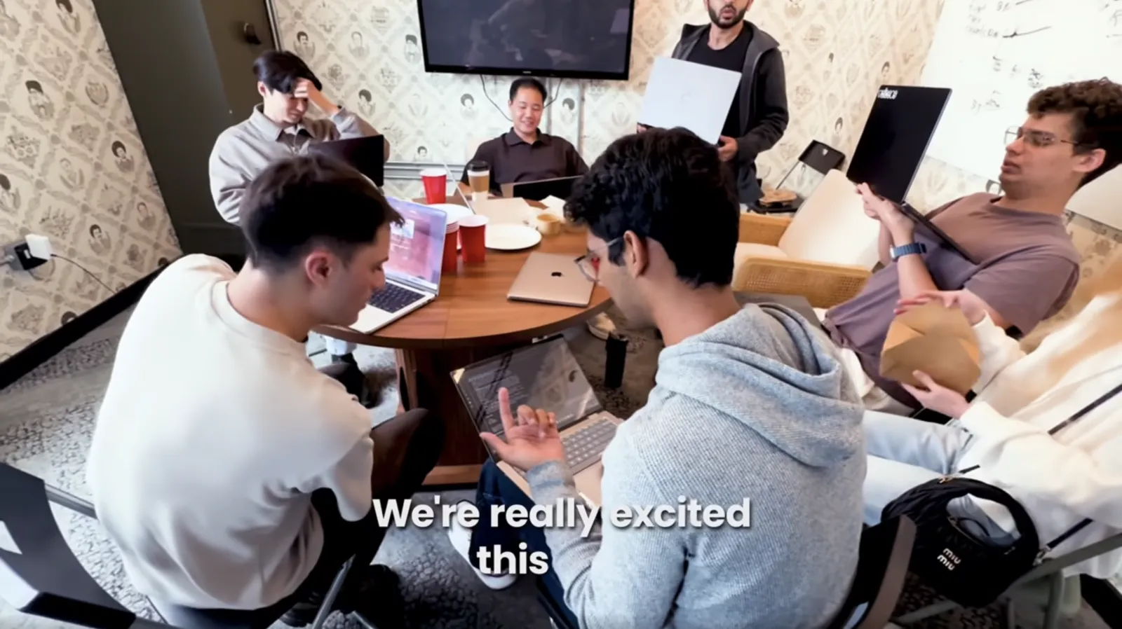 VoiceOS hackathon builders collaborating around a table